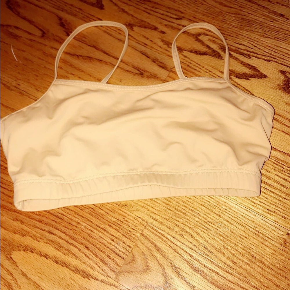 A tan sports bra.
